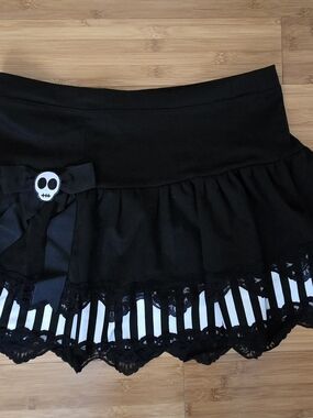 Black Gothic Mini Skirt with Skull Bow Accent